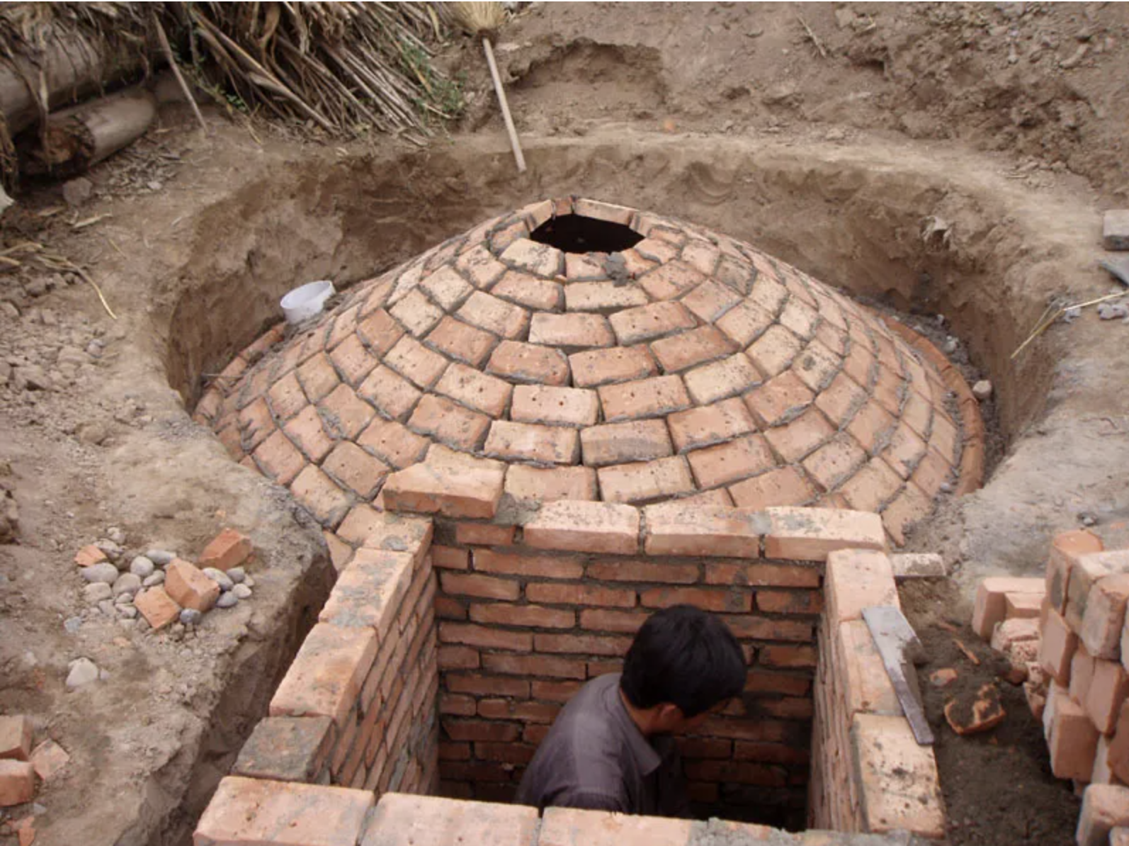 traditional brick biogas digester on site