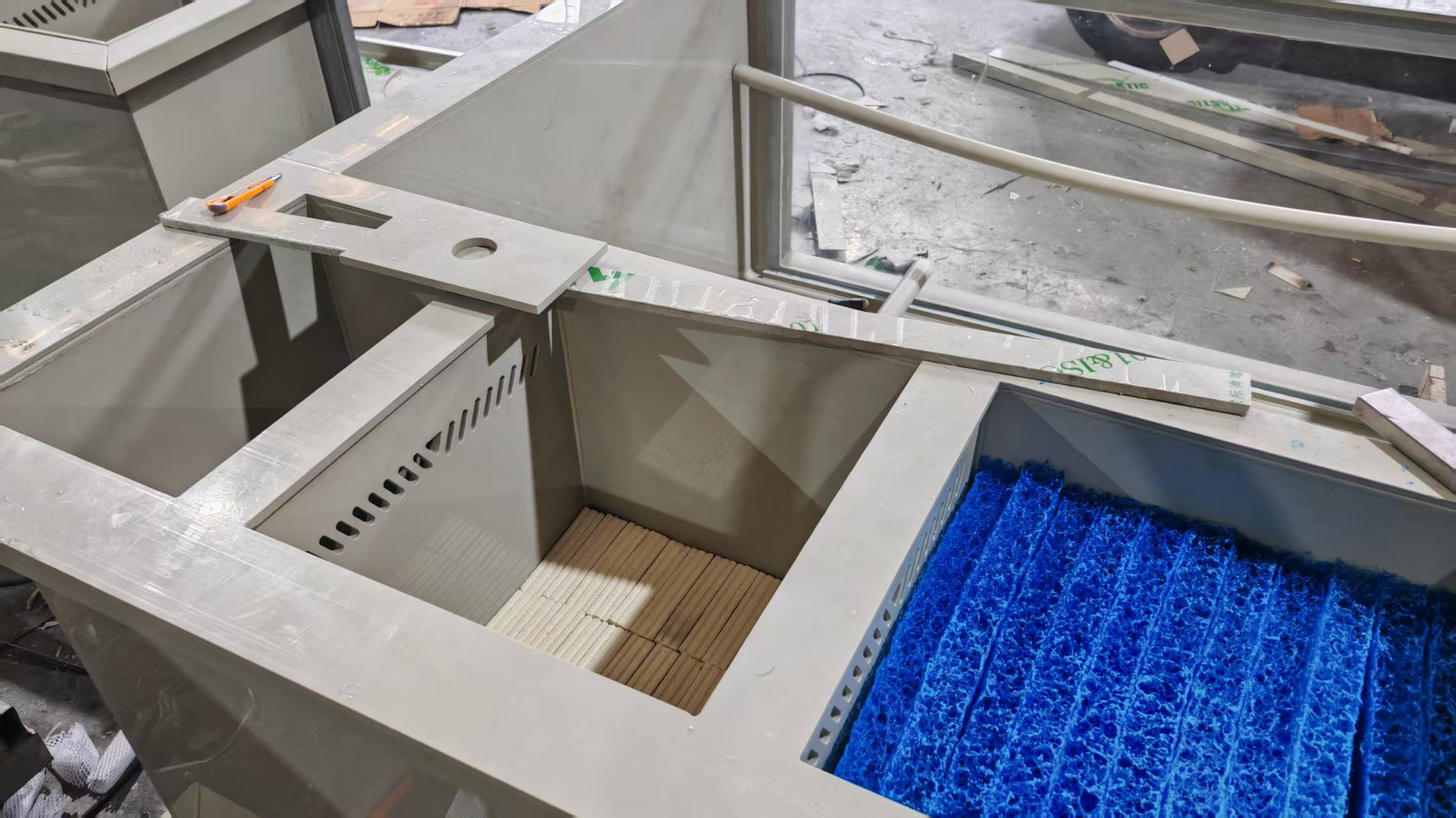 Integrated filtration chamber inside custom PP fish pond
